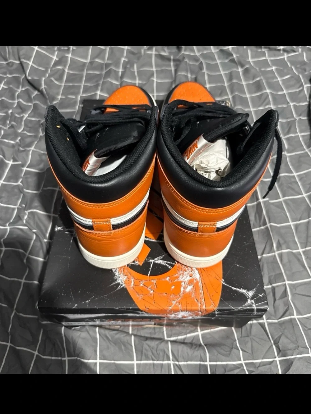 Nike Men’s Black and Orange High-Top Sneakers